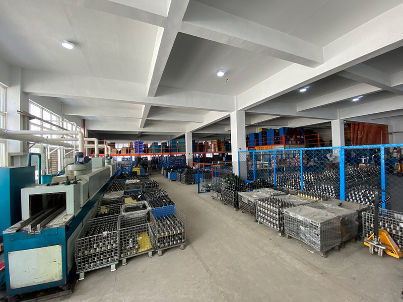 Organized warehouse with inventory racks and packaging area